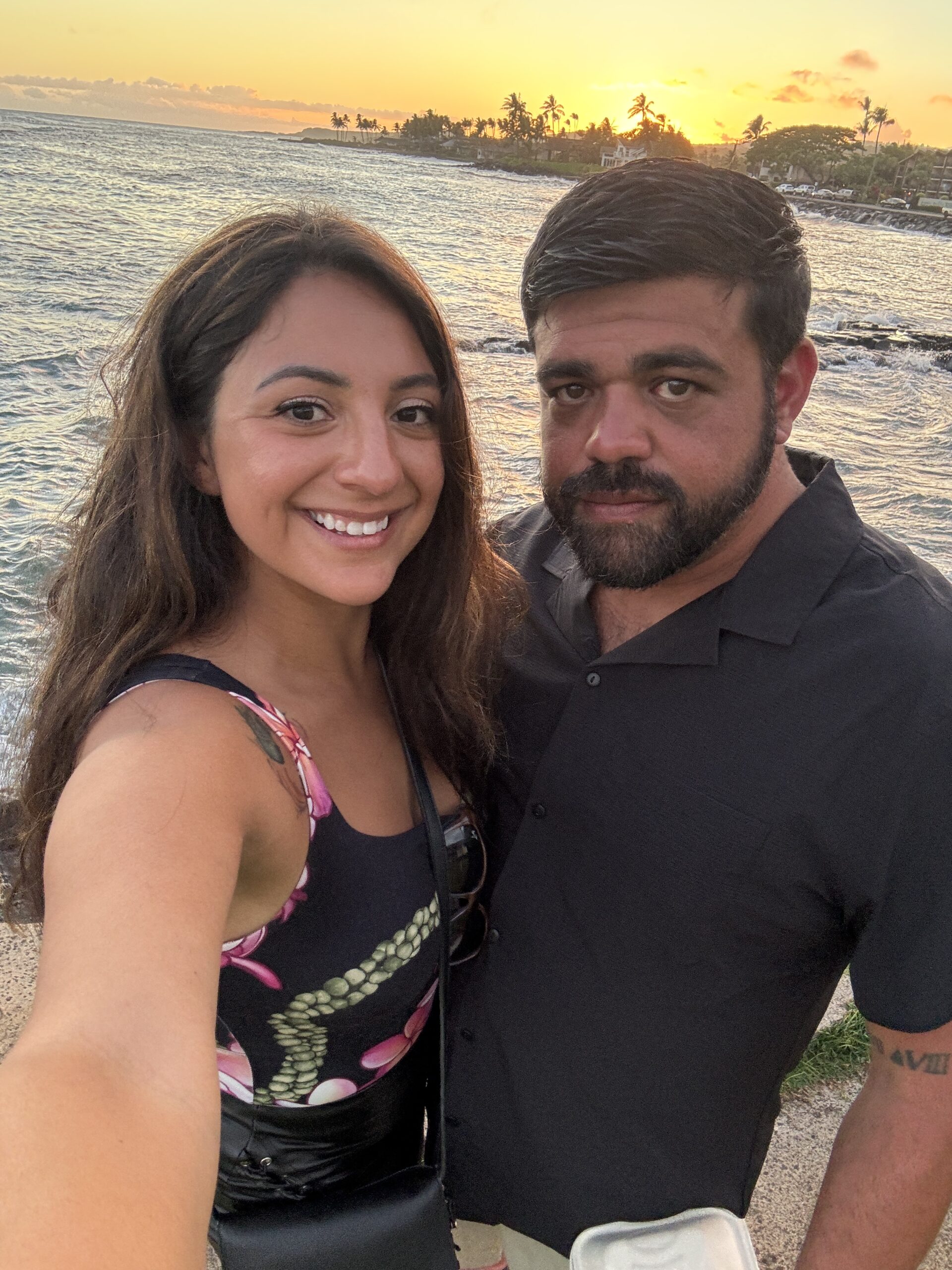 Cory and Vee on a Hawaii beach at sunset